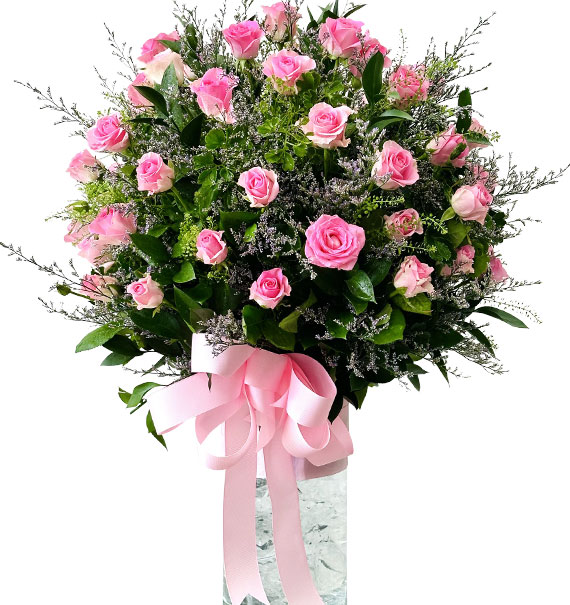 24 pink roses in vase